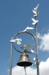 Bell and doves
