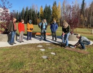 Placing the Memorial Paver for Chris White at the Laborer's Local 942 Memorial Park